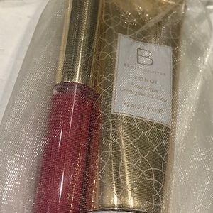 Brand new mini lip gloss/hand cream with gift bag!